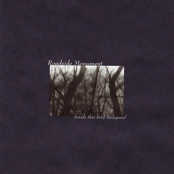 ROADSIDE MONUMENT - BESIDE THIS BRIEF HEXAGONAL