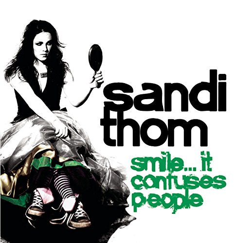 THOM, SANDI - SMILE...IT CONFUSES PEOPLE