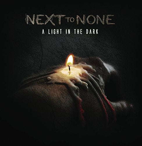 NEXT TO NONE - A LIGHT IN THE DARK