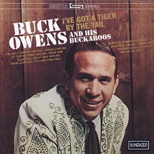 BUCK OWENS & HIS BUCKAROOS - IVE GOT A TIGER BY THE TAIL