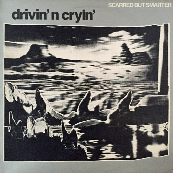 DRIVIN N CRYIN  - SCARRED BUT SMARTER